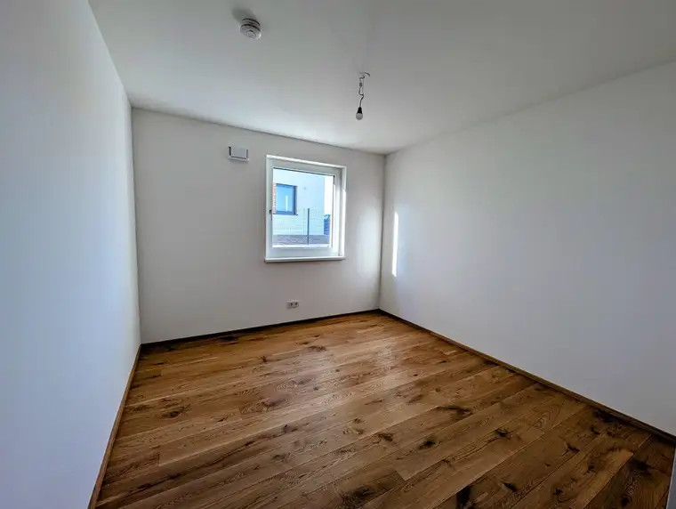 Großzügige 4 Zimmer Erstbezugs-Garten-Wohnung im Ortszentrum von Hallwang!