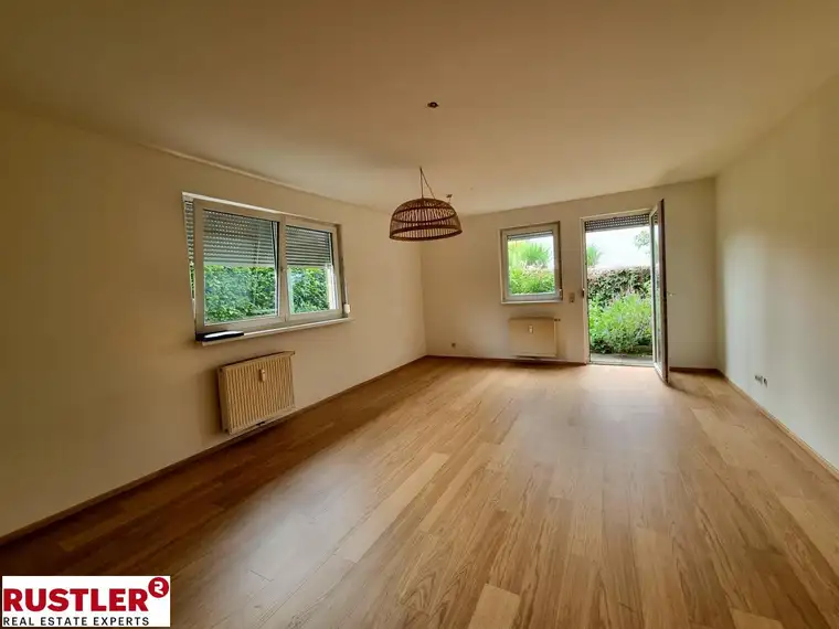Charmante 3-Zimmer-Wohnung mit eigenem Garten, Terrasse &amp; Tiefgaragenplatz
