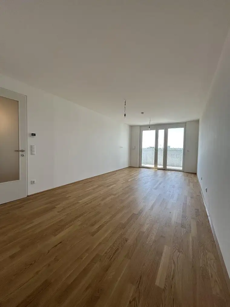 Traumhafte Terrassenwohnung in Wien: Erstbezug mit Balkon und Garage!