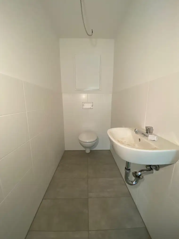 PROVISIONSFREI - Erstbezug - Helle 2-Zimmer-Wohnung mit Loggia in ruhiger Lage - geförderte Miete - 2 Zimmer 