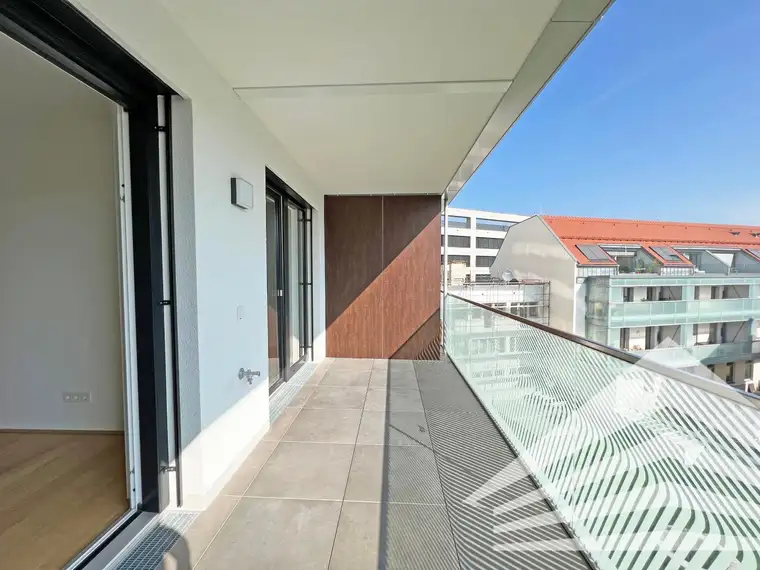 Exklusive 2 Zimmer-Neubauwohnung mit Küche &amp; großer Loggia in bester Innenstadtlage