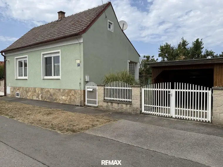 Einfamilienhaus mit Naturgarten,Werkstatt, beheizbares Nebengebäude, Carport