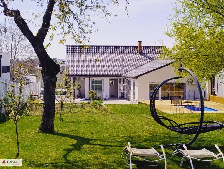 Top-ausgestattetes Wohnhaus mit gepflegtem Garten