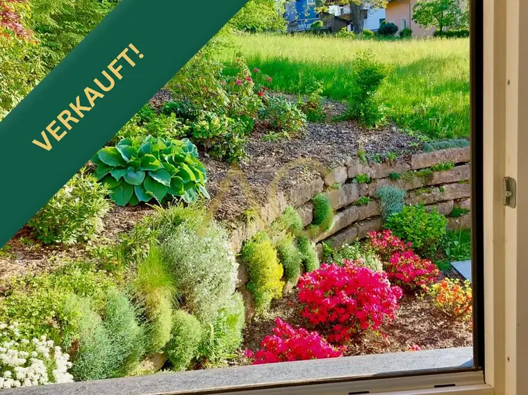 Schöne Gartenwohnung mit Souterrain und großer Garage
