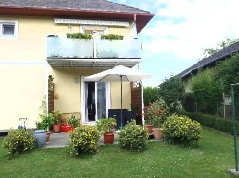 ! VERMIETET ! Mietwohnung mit überdachtem Balkon und Garten
