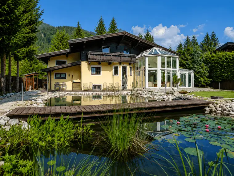 Objekt Nr.: P1119:St. Ulrich a.P. - Außergewöhnliches Landhaus mit Einliegerwohnung, Schwimmteich und stilvollem Wintergarten in Traumlage