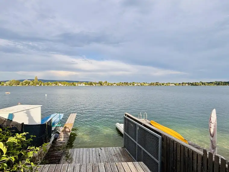 Direkt am See gelegen – in erster Reihe! Traumhaft schönes Grundstück am Neufelder See | Perfekt für einen Neubau