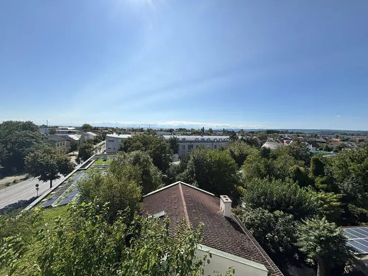 Exklusive Erstbezugs-Dachgeschosswohnung mit Loggia &amp; Seeblick in zentraler Lage von Neusiedl
