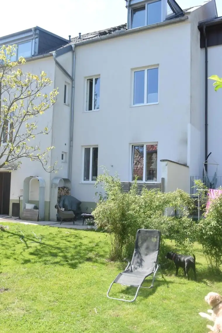 Jahrhundertwende-Hausanteil mit Gartenbereich