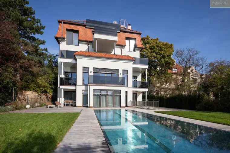 Wohnungseigentumspaket in einzigartiger Luxus-Mehrfamilienvilla in Toplage mit Terrassen, Garagen und Erdwärmeheizung