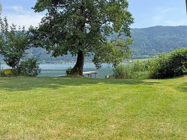 Sonnige Gartenwohnung mit privatem Seezugang