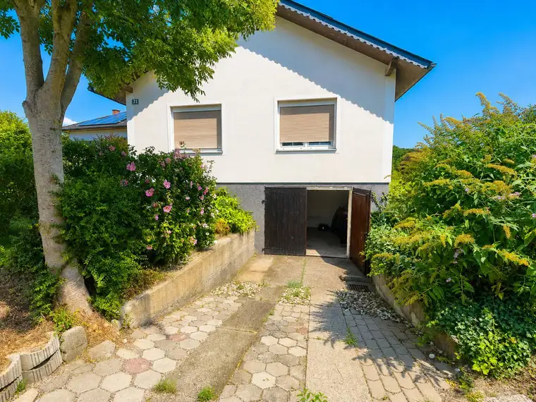 Liebliches Einfamilienhaus mit großem Garten in Siedlungslage