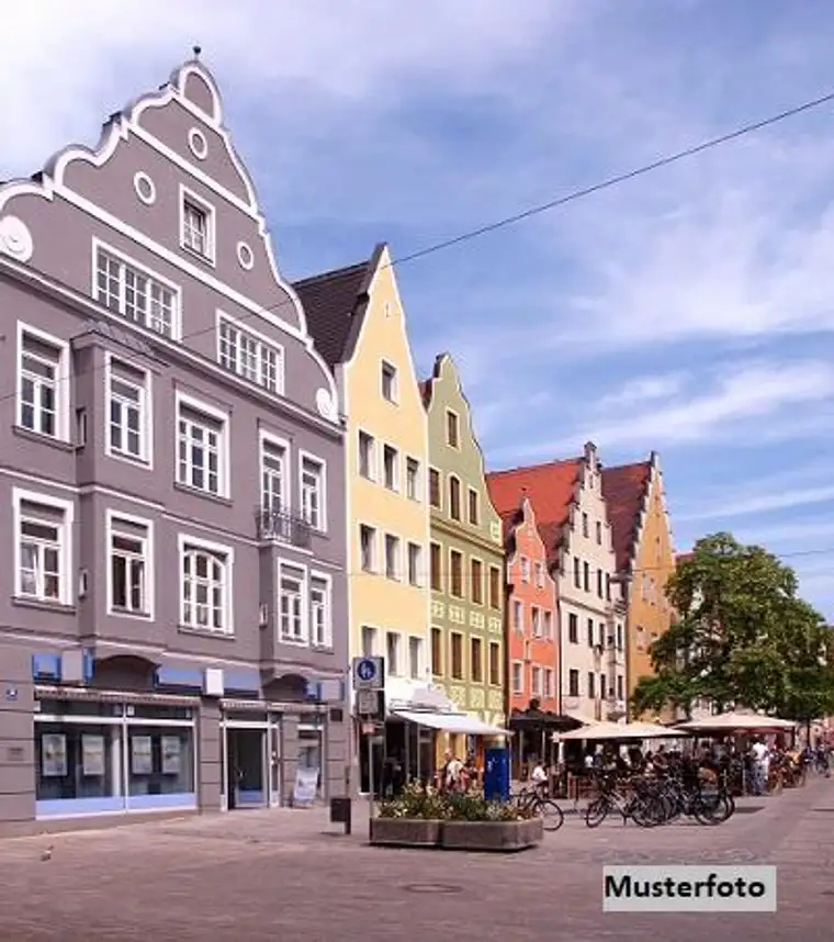 Historisches Wohn- und Geschäftshaus mit modernem Neubautrakt und Dachterrasse