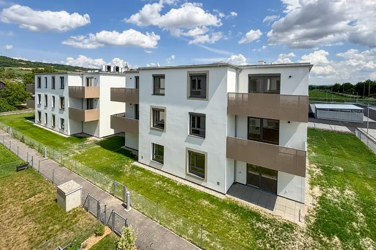 Südwestseitige Erstbezugswohnung mit großen Garten