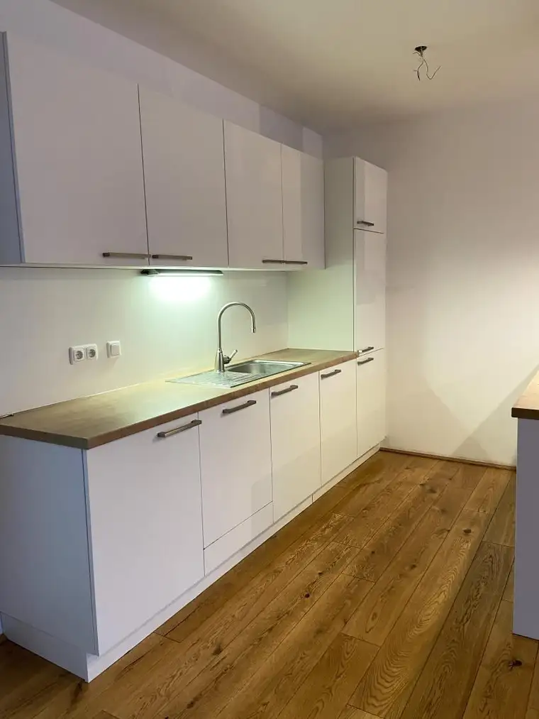 Sonnige Maisonette in bester Lage - inkl. Einbauküche, Terrasse und Garten - Top H05