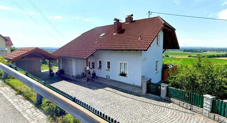 Traumhaftes Einfamilienhaus mit Weitblick in Hanglage – Zwei Wohneinheiten mit viel Potenzial