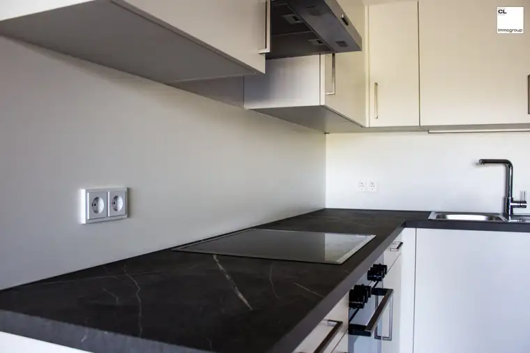 Moderne Gartenwohnung mit großer Sonnenterrasse &amp; Garagenstellplatz!
