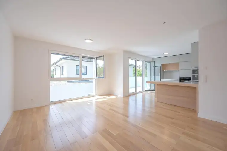 Neubau - Erstbezug - hochwertige Küchenausstattung - großer Balkon - Carport - bei Baden