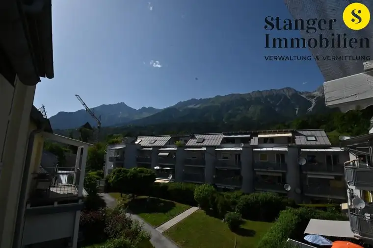 VERKAUF - Ruhig gelegene 2-Zimmer-Wohnung mit Blick auf die Berge, 2 Balkone und TG-Abstellplatz 
