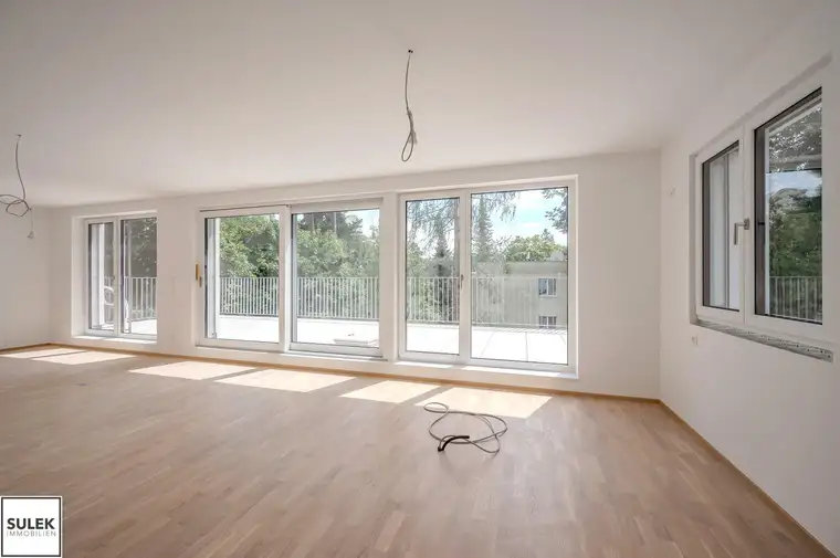 Exklusiv Wohnen in Grünruhelage: großzügige 2 Zimmer Erstbezugswohnung mit südseitiger 30m2 Terrasse – jetzt vormerken &amp; 9/25 einziehen!