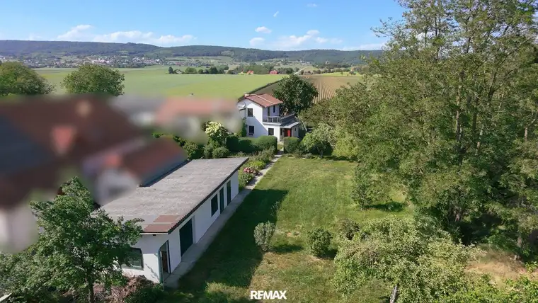 Einzigartiges Immobilienpaket: Zwei Grundstücke &amp; Eigentumswohnung