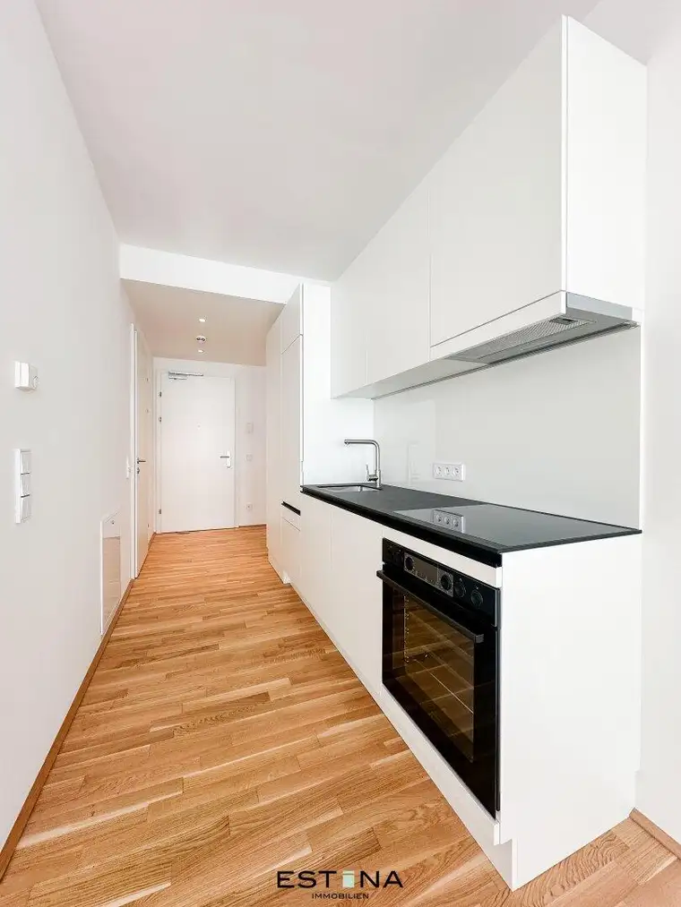 Nähe U1 Station Kaisermühlen - Singlewohnung mit optisch abgetrenntem Schlafbereich - Neubau