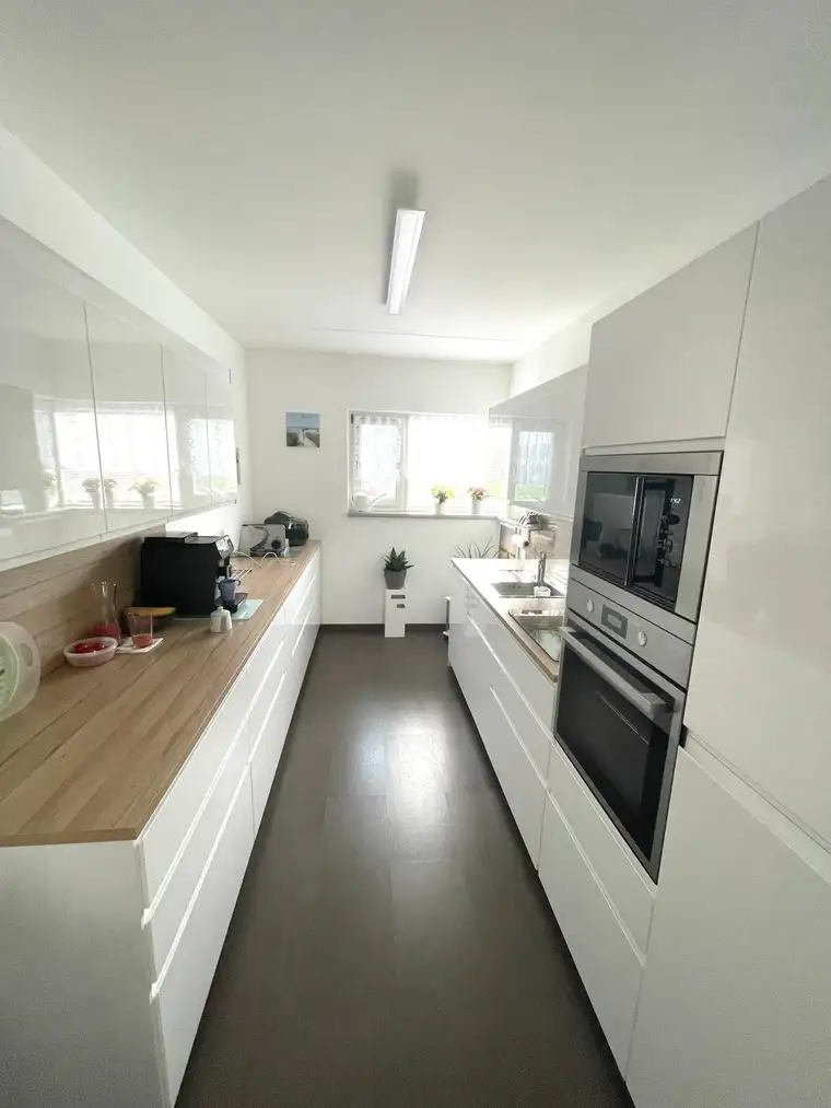 Lichtdurchflutete Maisonette mit Balkon und Garten