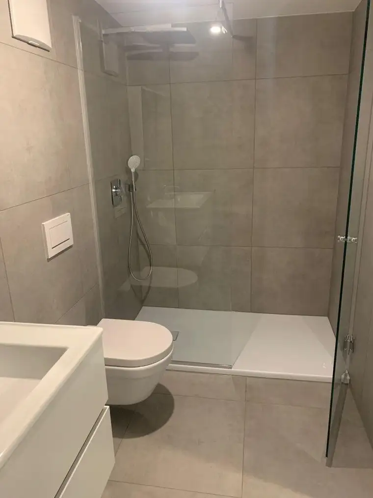 Erstbezug: Wohnung mit Reihenhauscharakter mit Wintergarten in Grünlage