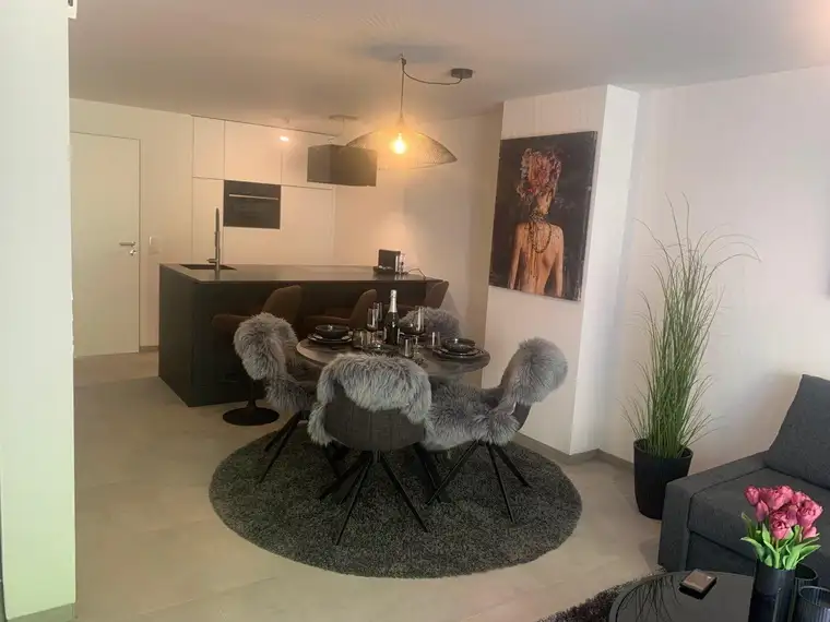 Erstbezug: Wohnung mit Reihenhauscharakter mit Wintergarten in Grünlage