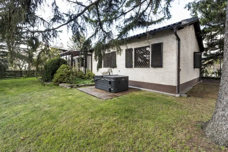 ​​​​​​​Charmantes Einfamilienhaus in Perchtoldsdorf mit sonnigem Garten