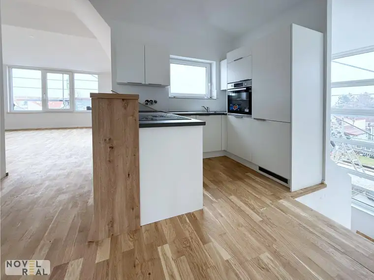Außergewöhnliche DG-Wohnung mit 4 Terrassen und eigenem Liftzugang!