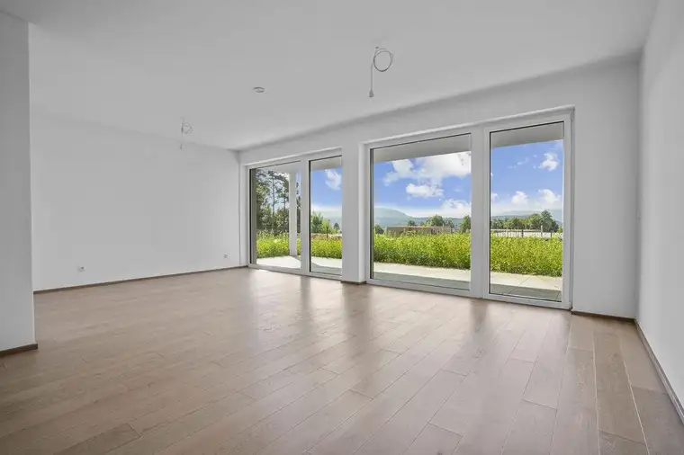 Velden HILLS! Bezugsfertige 3-Zimmer-Gartenwohnung mit Bergblick