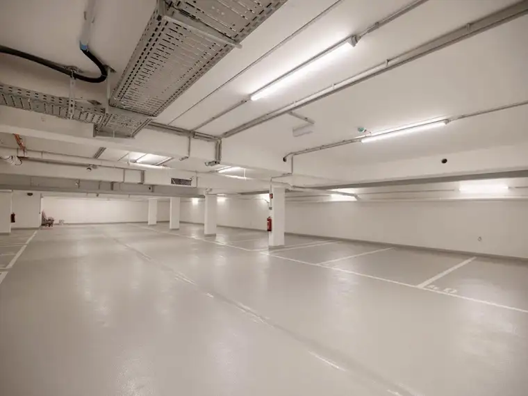 Vollwertiger Einzelstellplatz in hauseigener Tiefgarage - Wohnbauprojekt Ziag 144