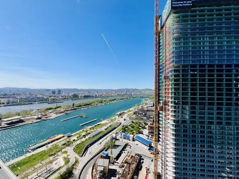 Danubeflats | 26. Etage | nur 350 m zur U1 | Sunset-Balkon | Erstbezug | Exklusiver Membersclub | Skygarden | Tiefgaragenplatz