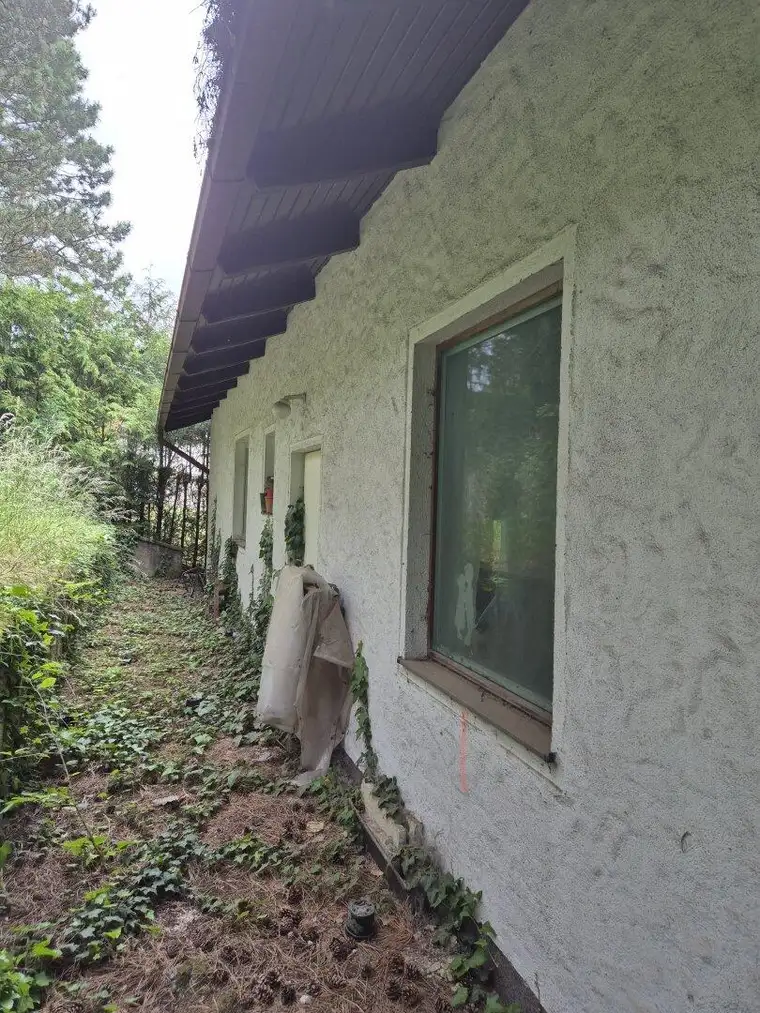 Sanierungsbedürftiges Einfamilienhaus in Hanglage