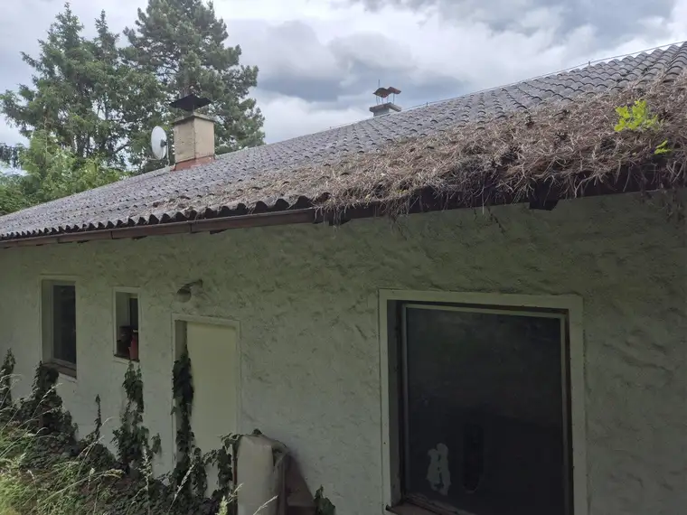 Sanierungsbedürftiges Einfamilienhaus in Hanglage