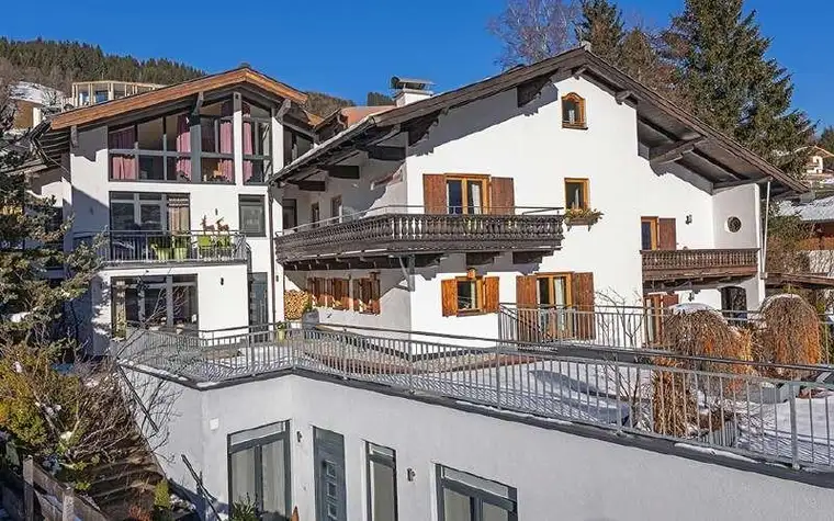 Two large interconnecting mountain chalets plus separate apartment for sale in the centre of the world famous ski resort of Hinterglemm