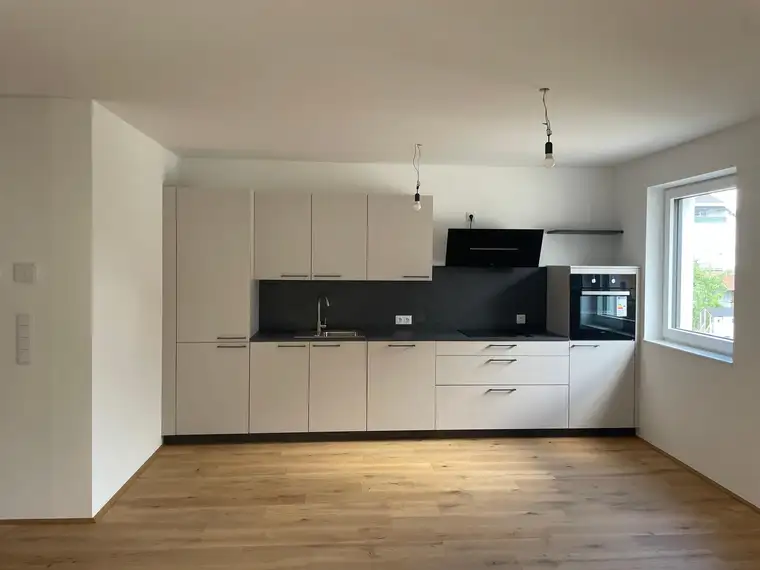Neubau 4-Zimmer-Wohnung mit sonnigem Balkon in Irrsdorf !WOHNBAUFÖRDERUNG!