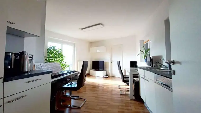 Attraktive Anlegerwohnung mit großem Garten und Carport!