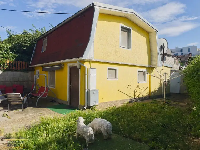 Charmantes Einfamilienhaus in idyllischer Kleingartensiedlung nahe U1 „Altes Landgut“