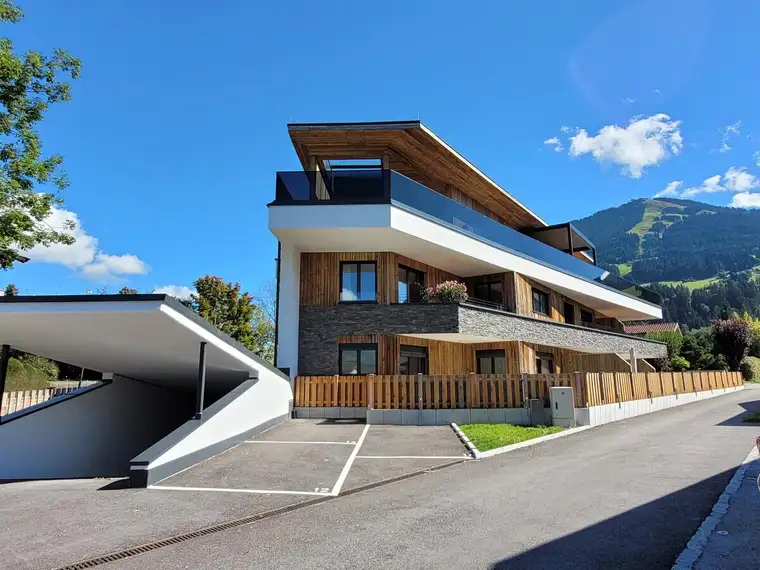 Exklusive Gartenwohnung in ruhiger Sonnenlage mit herrlichem Natur- und Bergpanorama
