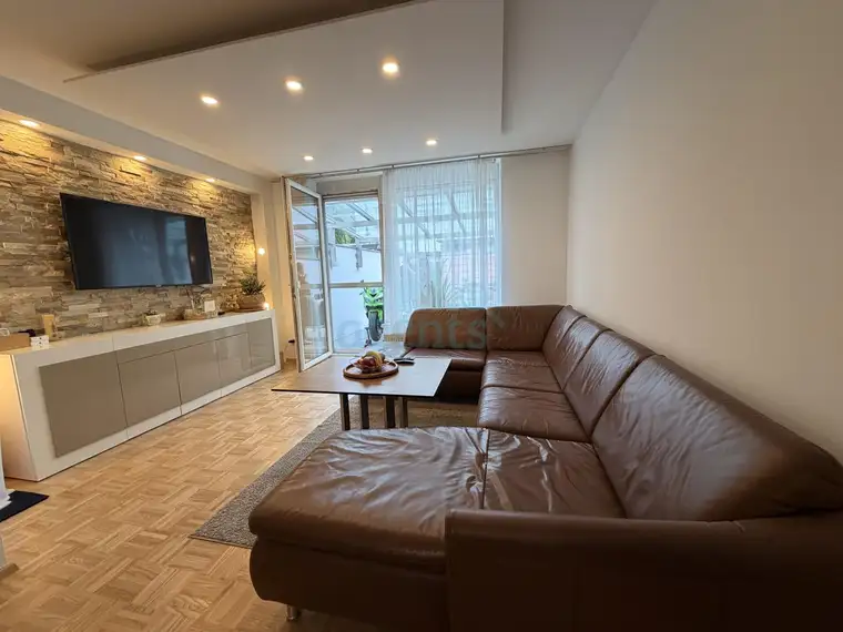 Neuer Preis! Voll unterkellertes Reihenhaus mit Terrasse, Garten und Garage in autofreier Wohnlage