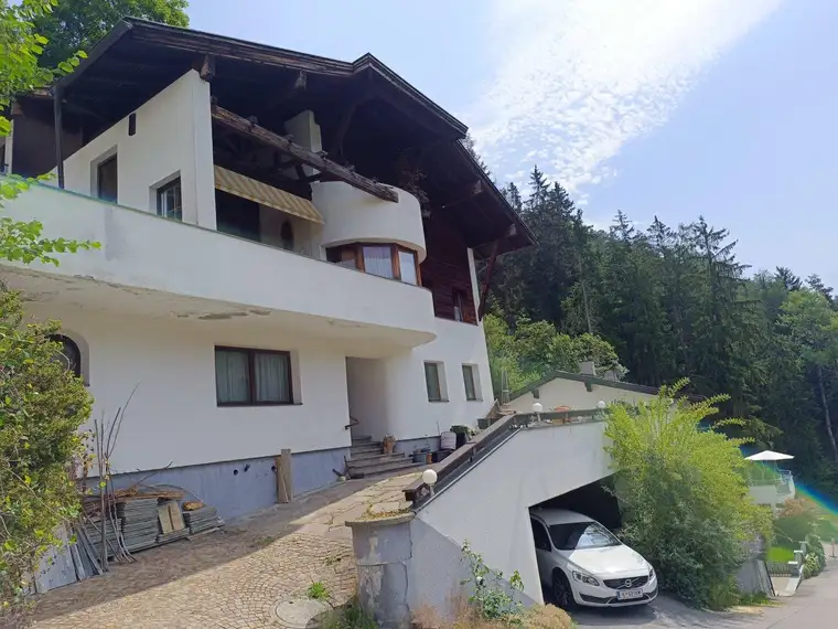 Haus in 0mes 180m² mit Garten, Garage und atemberaubendem Bergblick!