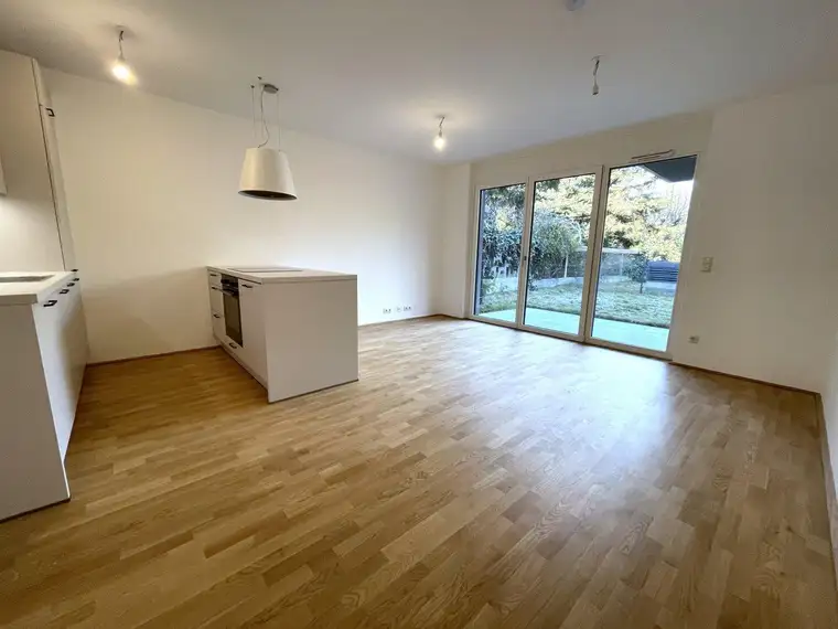 Ruhig gelegene 3-Zimmer Gartenwohnung mit großer Grünfläche - Luftwärmepumpe + Klimavorbereitung - ab 01.09