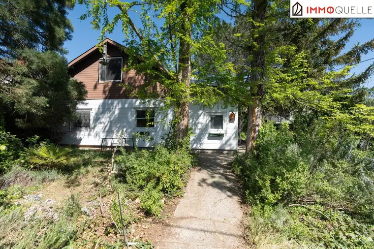 Wohnen im Grünen in Wien - Charmantes Einfamilienhaus mit Garten, Garage und viel Entwicklungspotenzial!
