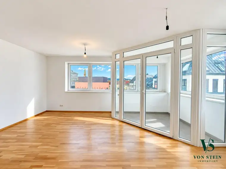 Lichtdurchflutetes Wohnen über den Dächern Wiens – Stilvolle Wohnung mit Wintergarten und Stadtblic