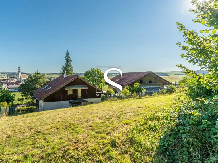 NEST mit AUSSICHT | Großzügiges Hanggrundstück mit Bestand | Irrsdorf