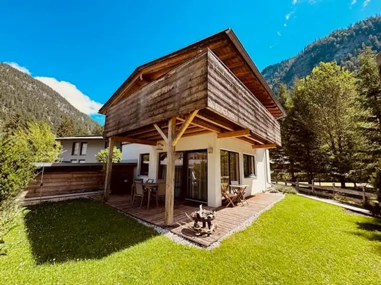 "Holzhaus 'Natura": Wo Eleganz und Nachhaltigkeit in perfekter Harmonie verschmelzen