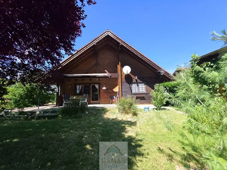 Holzhaus mit Garten &amp; Seezugang – Wohnen, wo andere Urlaub machen!