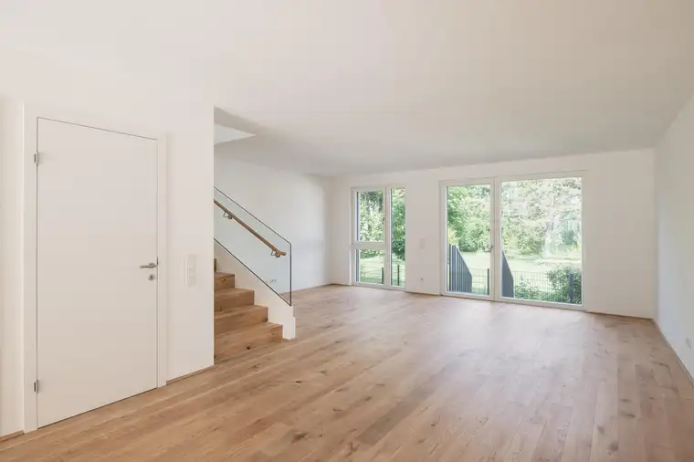 Grün soweit das Auge reicht - Stadtvilla mit kühlem Komfort